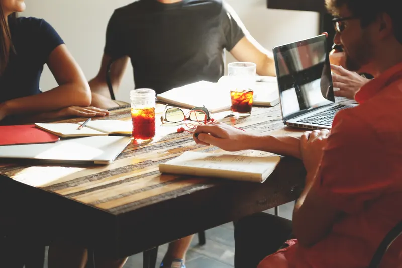 A small team working together at one table